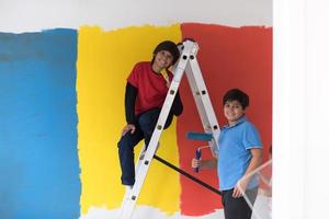 boys painting wall photo