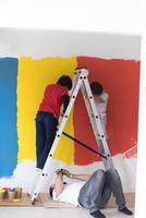 boys painting wall photo