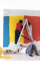 boys painting wall photo