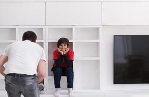 young boys posing on a shelf photo