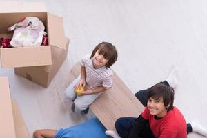 boys with cardboard boxes around them top view photo