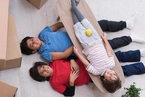 boys with cardboard boxes around them top view photo
