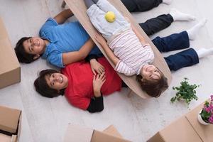 boys with cardboard boxes around them top view photo