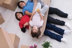 boys with cardboard boxes around them top view photo