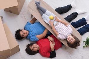 boys with cardboard boxes around them top view photo