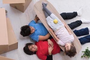 boys with cardboard boxes around them top view photo