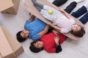 boys with cardboard boxes around them top view photo