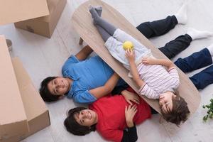 boys with cardboard boxes around them top view photo