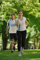 Young couple jogging photo