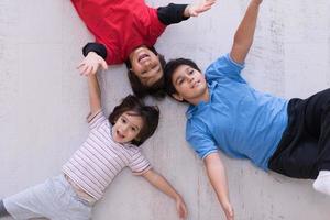 young boys having fun on the floor photo