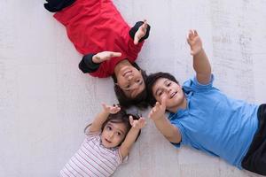 young boys having fun on the floor photo