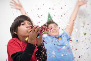 kids  blowing confetti photo