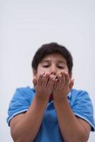 kid blowing confetti photo