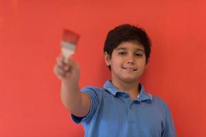 Portrait of a happy young boy painter photo