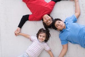 young boys having fun on the floor photo