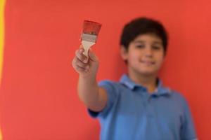 Portrait of a happy young boy painter photo