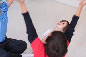 young boys having fun on the floor photo