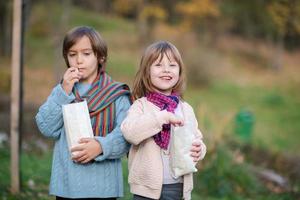 kids in park eating popcorn in park photo