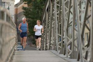 Couple jogging outside photo