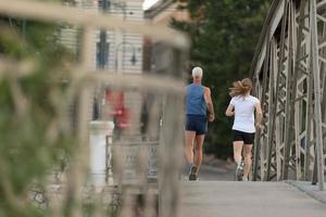 Couple jogging outside photo