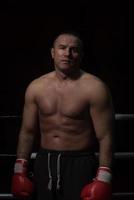 portrait of muscular professional kickboxer photo