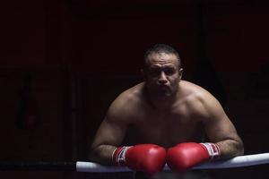 portrait of muscular professional kickboxer photo