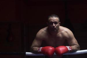 portrait of muscular professional kickboxer photo