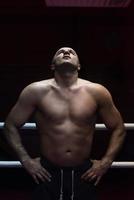 portrait of muscular professional kickboxer photo