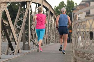 Couple jogging outside photo