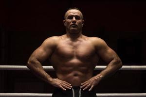 portrait of muscular professional kickboxer photo