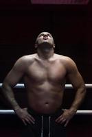 portrait of muscular professional kickboxer photo