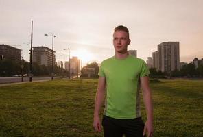 portrait of a young man on jogging photo