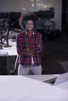 portrait of a young successful African-American woman in modern office photo