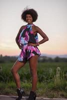 portrait of a young African-American woman in a summer dress photo