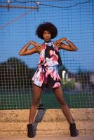 young African-American woman in a summer dress photo