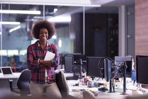 portrait of a young successful African-American woman in modern office photo