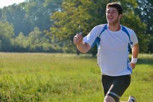 Young couple jogging at morning photo