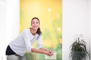 portrait of a young beautiful woman at home photo