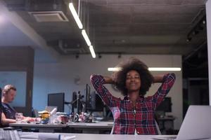 portrait of a young successful African-American woman in modern office photo