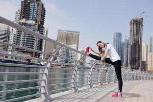 Young beautiful  woman jogging  on morning photo