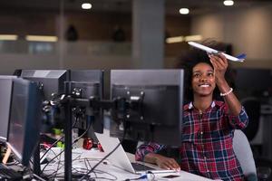 portrait of a young successful African-American woman in modern office photo