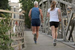 Couple jogging outside photo