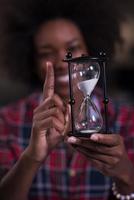 portrait of a young successful African-American woman in modern office photo