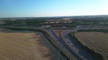 High Angle View of Luton Airport Junction Interchange of Motorways M1 J10 at Luton City of England UK. it is Connection Luton City and London Luton Airport Image Created on 11th August 2022 with Drone video
