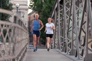 Couple jogging outside photo