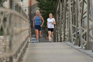 Couple jogging outside photo