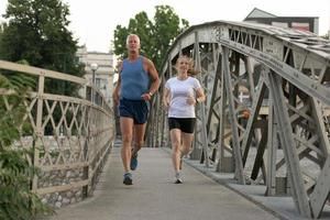 Couple jogging outside photo