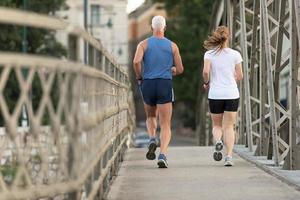 Couple jogging outside photo