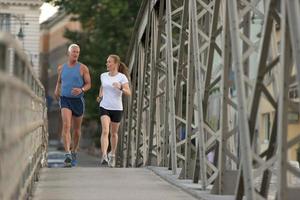 Couple jogging outside photo