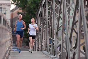 Couple jogging outside photo